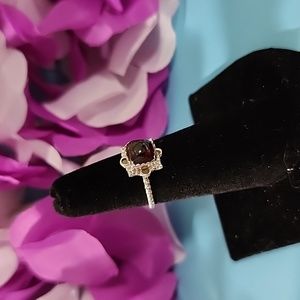 Size 5. Deep Red Garnet in a sterling silver 925 setting. NWOT